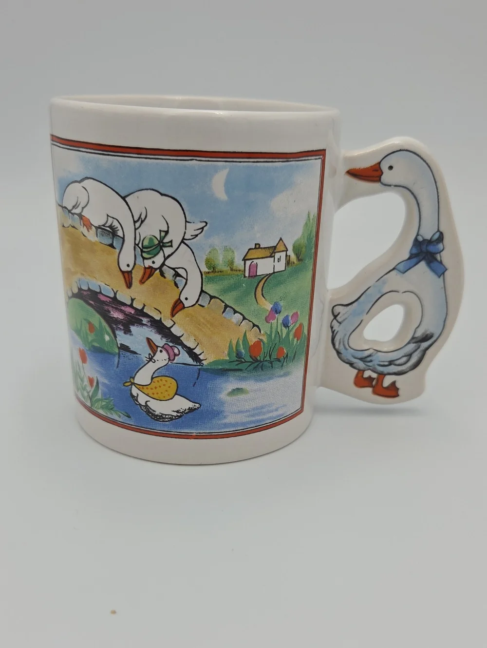 White Ceramic Goose Handle Mug with Colorful Farm Scene